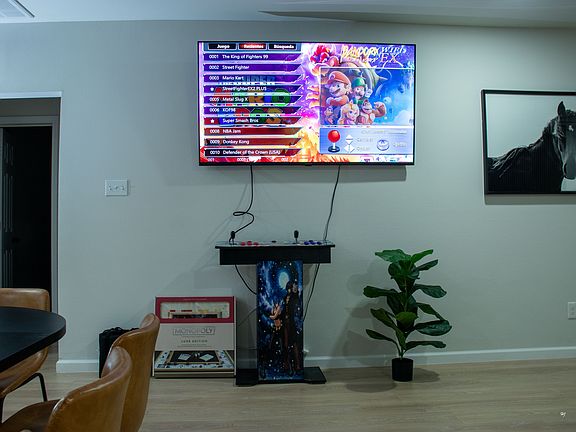 Includes a dedicated workspace and a custom arcade machine with 1000+ classic games.