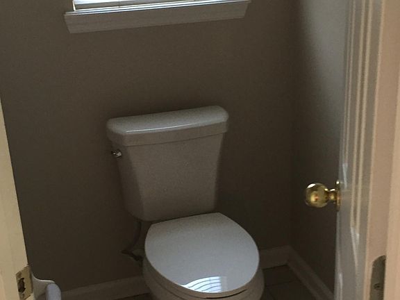 Elevated toilet in master