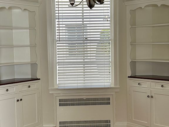 Dining room with built-in cabinets.