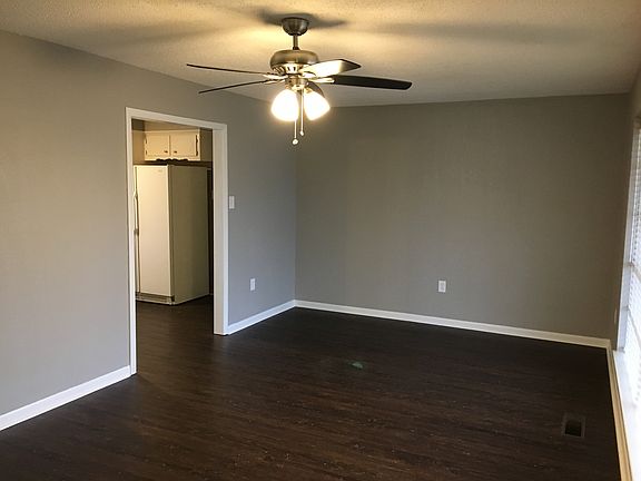Dining room with kitchen to the left