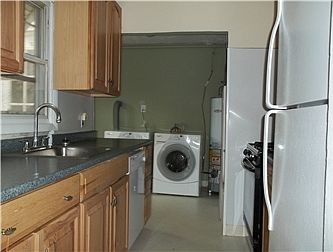 Another view of the Kitchen and Laundry Area