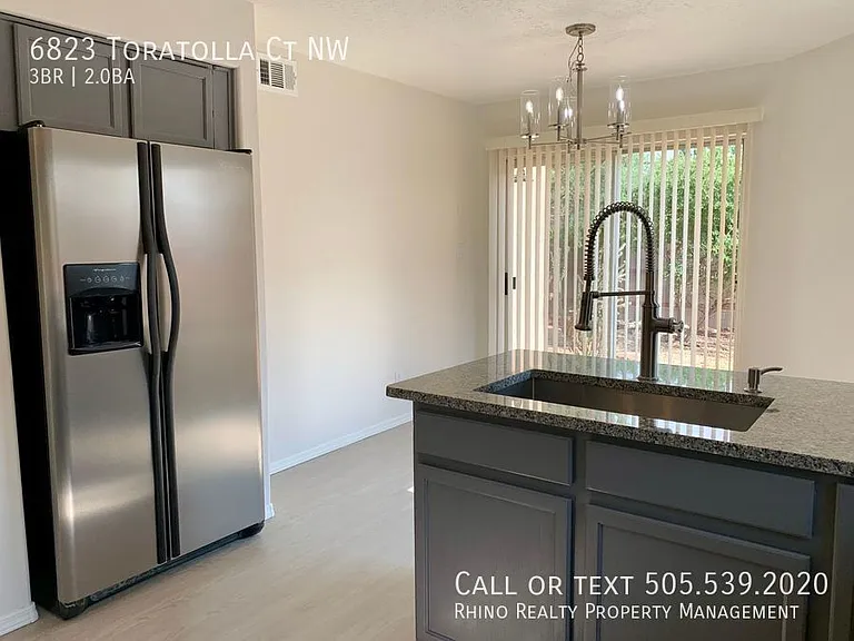 6823 Toratolla Ct NW — Photo 6