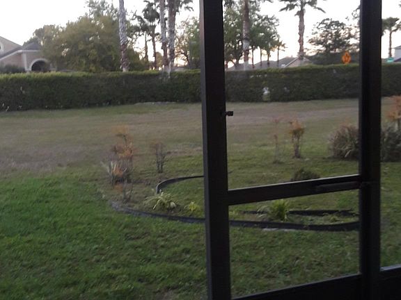 Covered patio and view of conservation