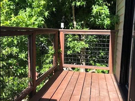 Landing at front door after tree fills out and provides privacy.