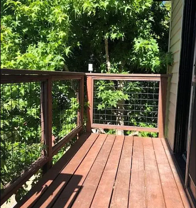 Landing at front door after tree fills out and provides privacy.