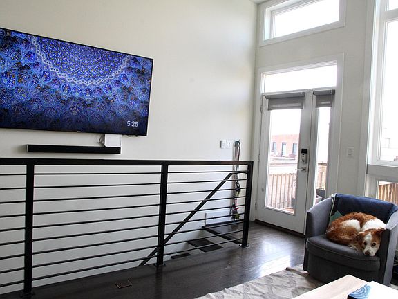 Condo comes with ready-to-use, 75" wall-mounted TV