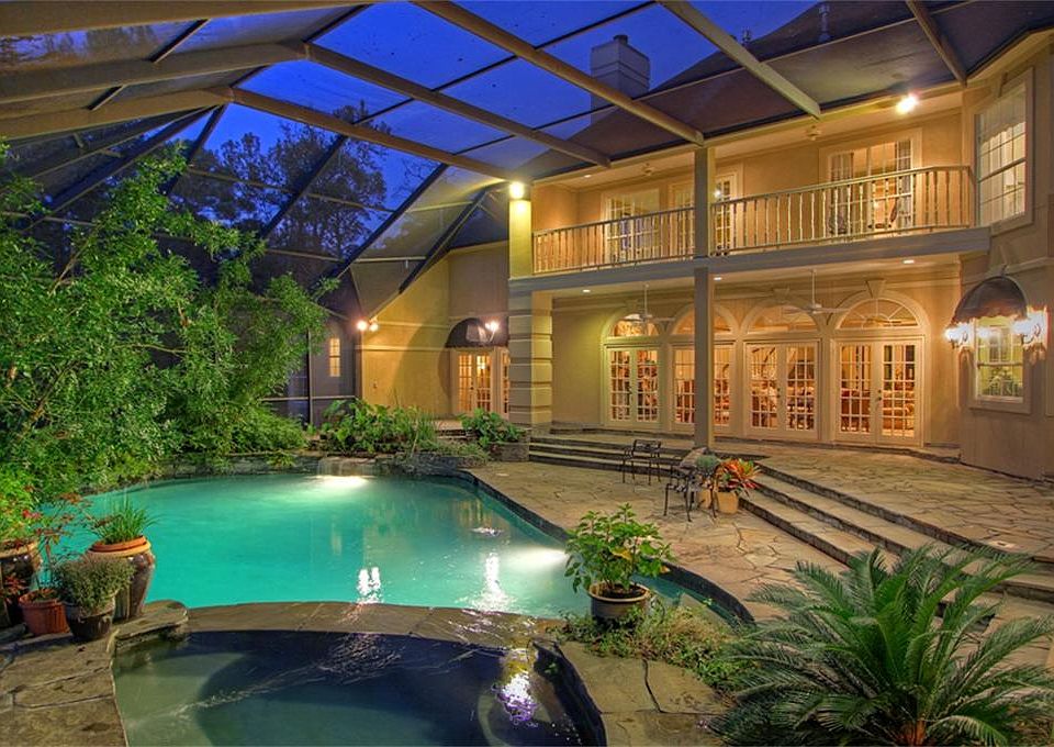 In the summer months, you will enjoy spending time in your backyard, which is home to a fully-enclos