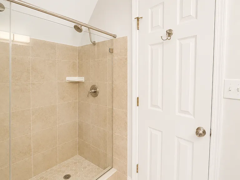 Upper level second bathroom shower