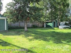 Backyard with 2 sheds