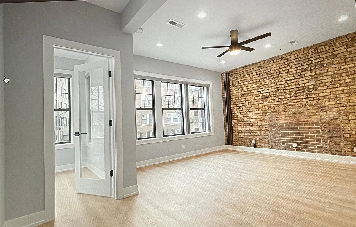 Building Photo - 7661 N Rogers Ave #1