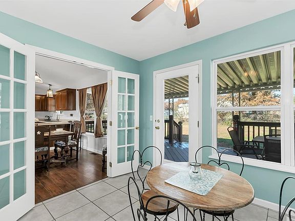 Breakfast room located right off the dining area that leads to the 22x10 covered deck