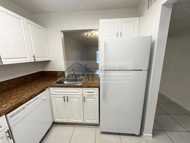 Colonial Village - 7550 Stirling Rd — Photo 34