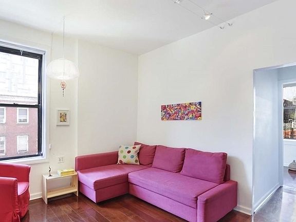 3rd image of 327 E 3rd St APT 2D