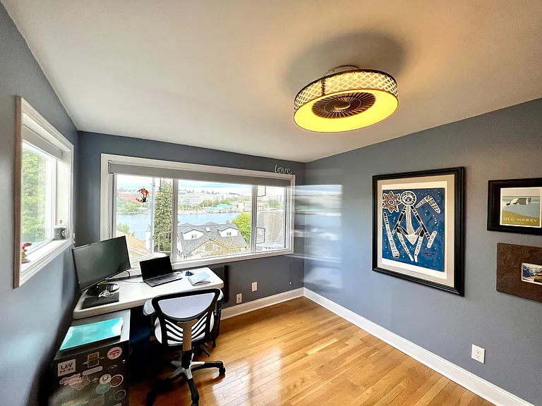 Bedroom 1 of 2 upstairs. This has views out over Lake Union and Portage Bay. House has a total of 5 bedrooms total (2 up, 2 main, 1 lower).