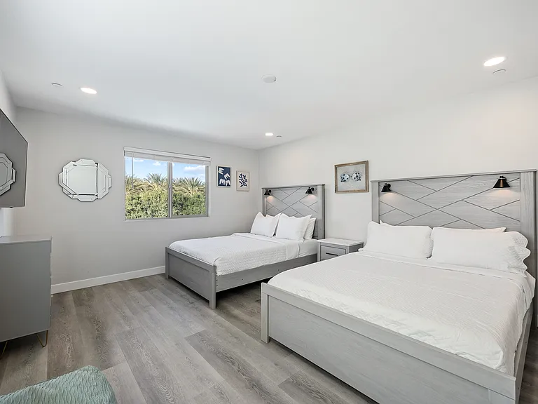 Bedroom 5 features two Queen-sized Beds.