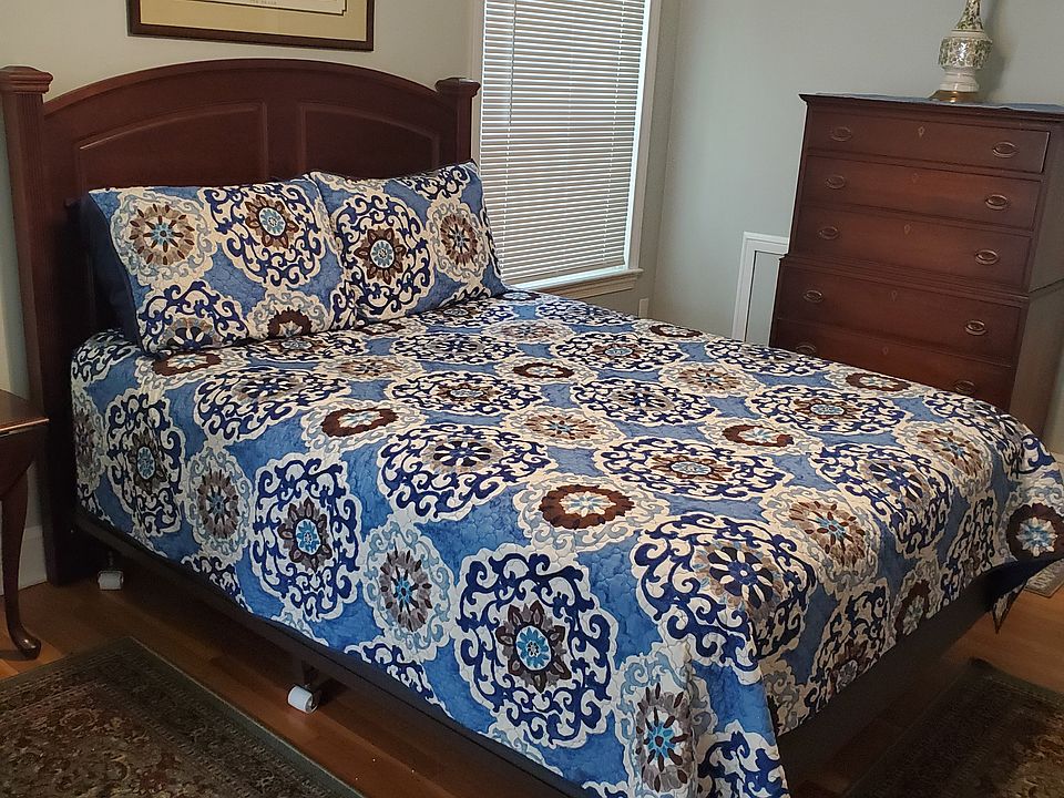 Bedroom #1 with queen bed with headboard and highboy chest