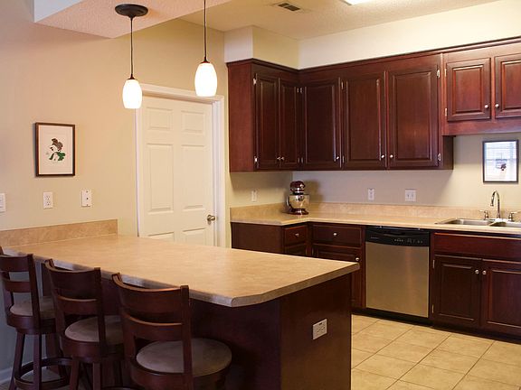 Door goes into separate laundry/pantry room