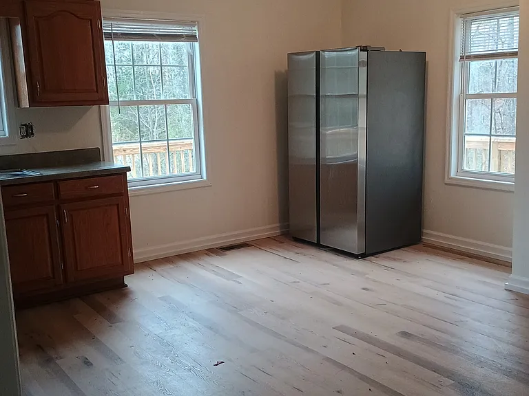 Kitchen with new flooring and paint. (Countertops have been changed since this photo)