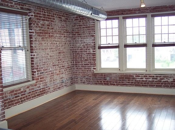 Living room with exposed brick