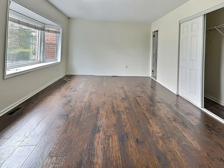 Master bedroom with bay window and en-suite bathroom
