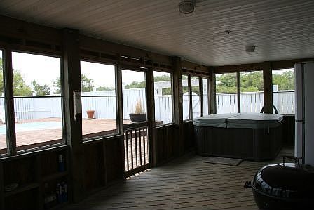 Hot tub in screen porch