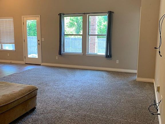 View from Entry to living room (Couch in photo will be removed.)
