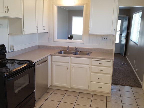 Kitchen with doorway to family room