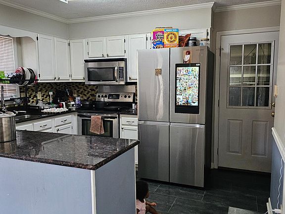 Kitchen, leading to garage
