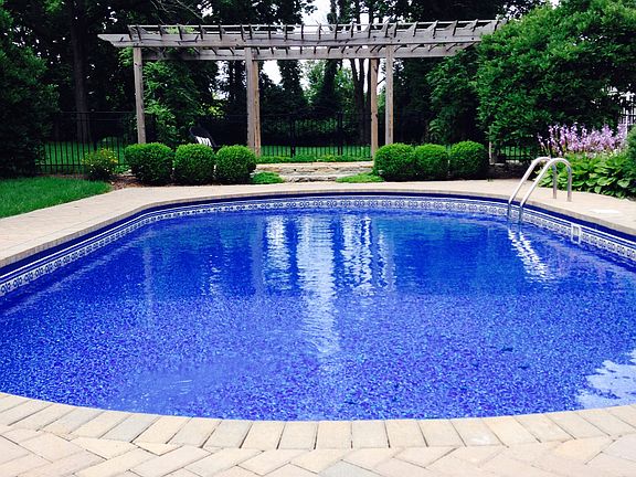 Inground pool and pergola