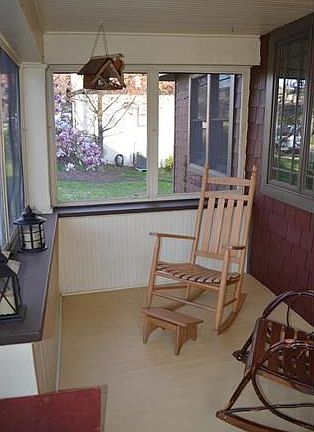 Welcoming Screened-in Front Porch!