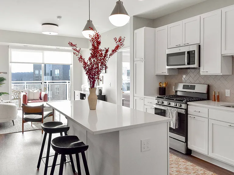 Elegance meets functionality in this stunning kitchen at The Hallon luxury apartments in Hopkins, MN