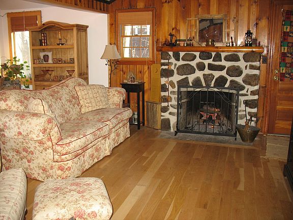 Fieldstone fireplace and hardwood floors throughout!