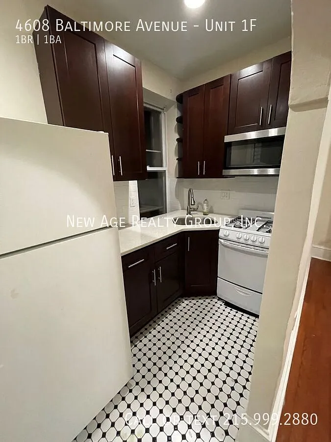 Building Photo - 4608 Baltimore Ave #1F