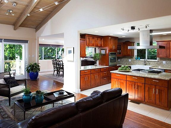 Kitchen overlooks Family room and fireplace