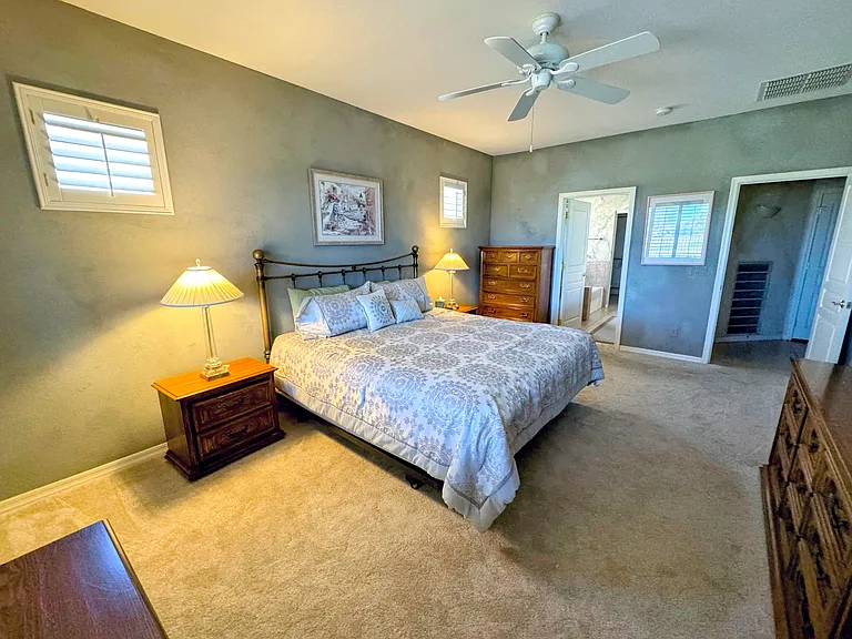 Master bedroom view looking back toward door and bathroom entry