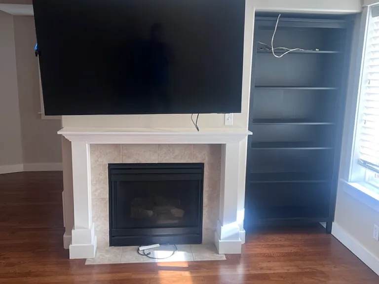 Gas fireplace and TV comes with unit.