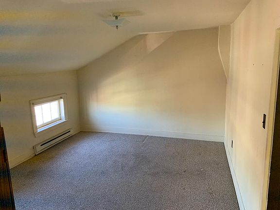 East end of Living room with kitchen entrance behind wall