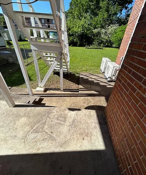 Unit 1 back stoop and shared back yard