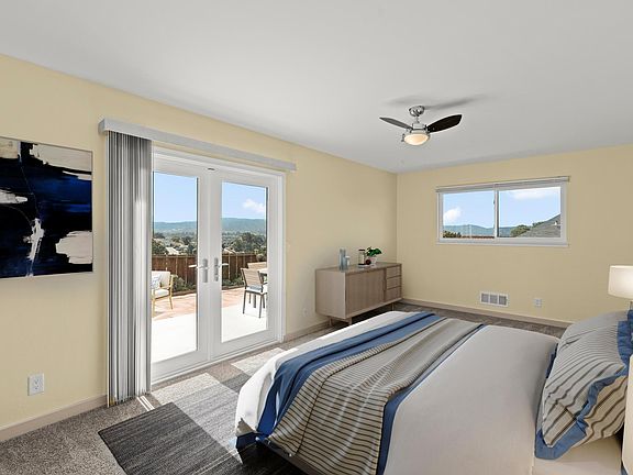 Primary bedroom refreshes you as you awaken to take on the day. (Picture virtually staged)