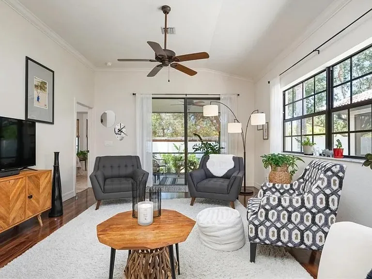 Living room with view to lanai to master