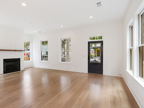 Living room with working fireplace.