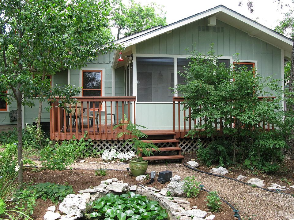 Backyard deck and screen porch, fishpond