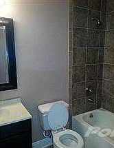 One of the 2 full and 2 half baths this home offers