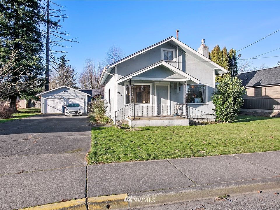 RV & boat parking, detached garage, and zoned for residential or business use.