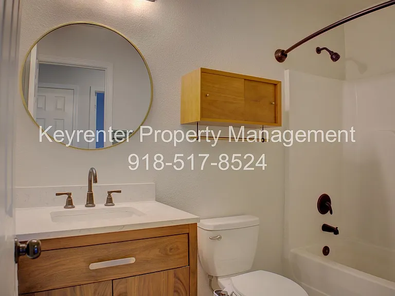 5839 E 148th Pl S — Photo 32