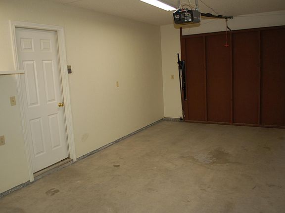 washer and dryer in garage. Auto garage door opener.