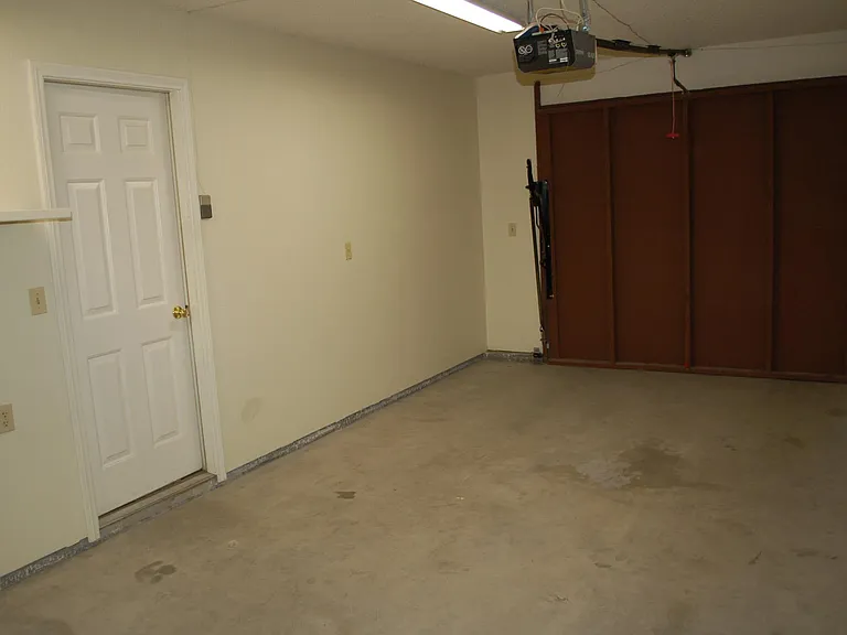washer and dryer in garage. Auto garage door opener.