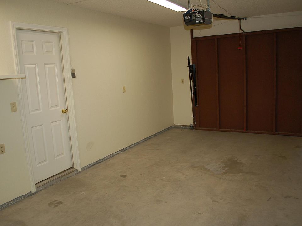 washer and dryer in garage. Auto garage door opener.