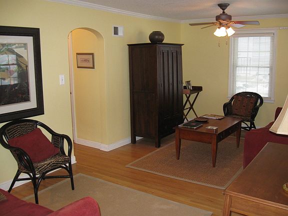 Living room with arched doorway