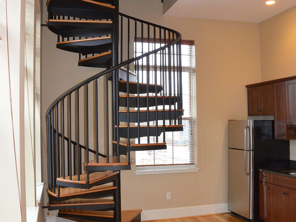51 Allen apt 303 spiral stairs from kitchen to upper level bedroom and bathroom